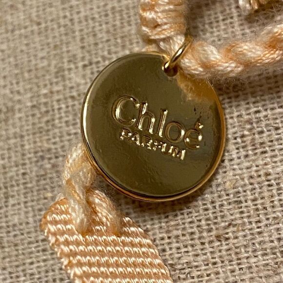 I am Chloe pink fabric bracelet with charm Chloe perfume one size fits most - Picture 3 of 7